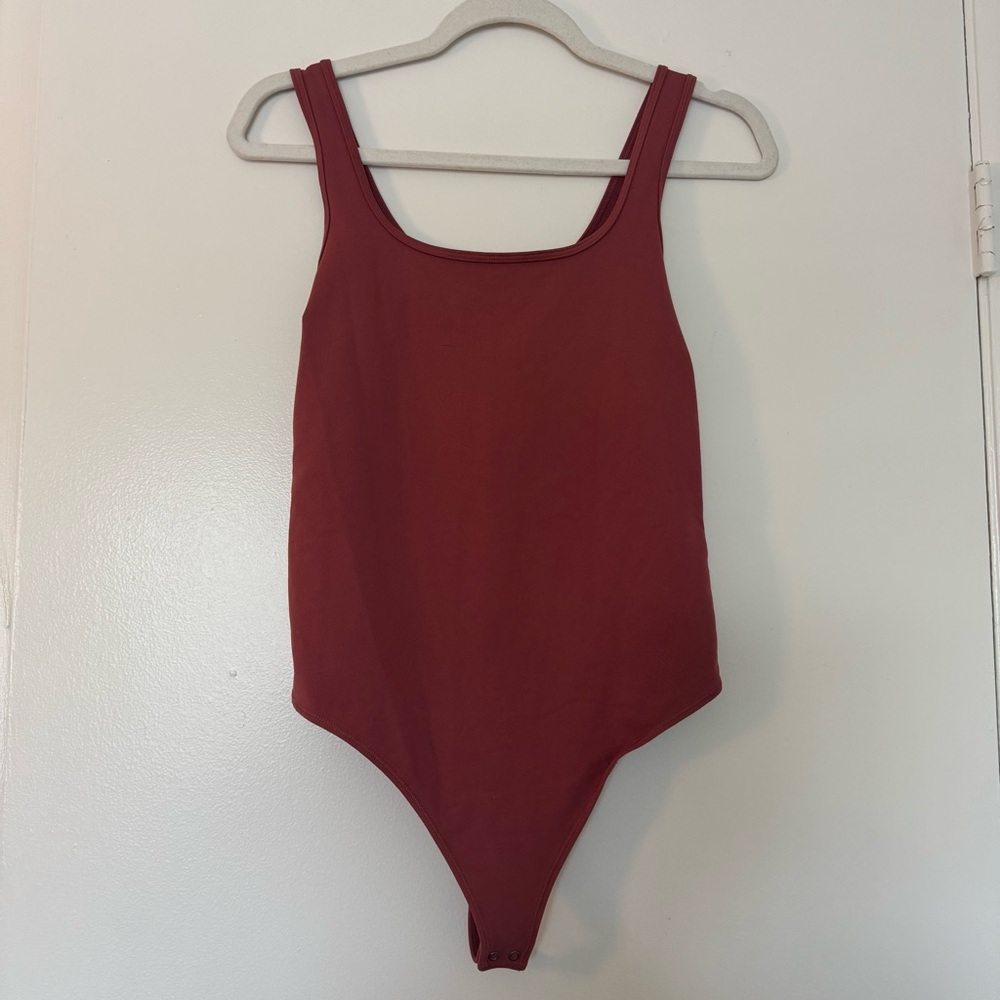 Abercrombie & Fitch Pink Bodysuit with Sleek Design